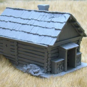 Large cabin with shingle roof and porch.