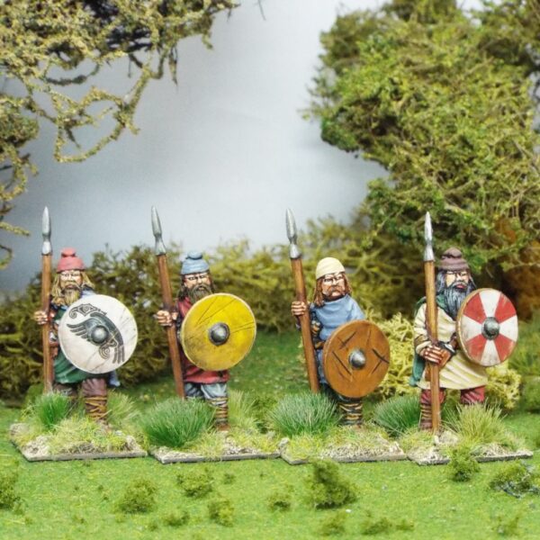 Duguth, (Veteran warriors) standing wearing caps with spears.