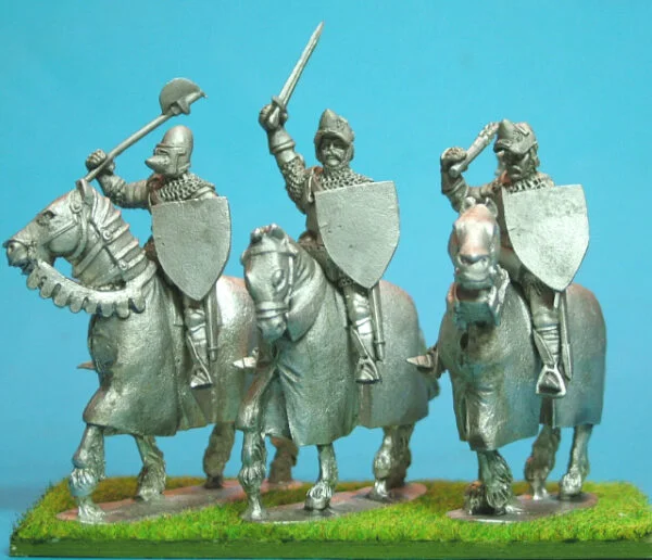 Mounted Knights, sword arm raised barded horses