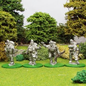 Home Guard NCO's wearing cap with rifles.