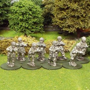 Fallschirmjager in German Tunic and 'Polish' paratrooper webbing etc with Sten Guns.